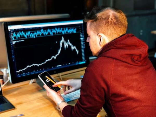 Bitcoin holds near $65,000 as $800 billion AI selloff leaves crypto largely untouched
